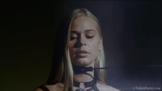 I would do it for you if I could. But for now, grab the shaft the crop and start sliding its keeper (the front part) against your chin and jaw.