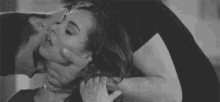 Hold her neck as you kiss her
