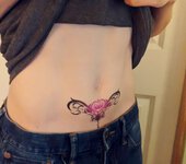 Reveal your womb tattoo