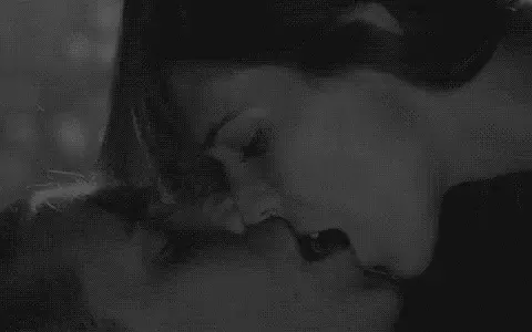 Kiss and bite his bottom lip