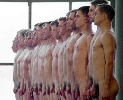 The overseers have decided that all matches today are to be fought naked. Stripping down, you and the rest of the fighters stand in line before them and the audience, much to the audience's delight.