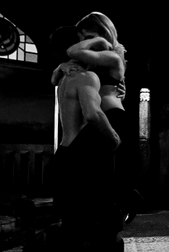 You lift her up in your arms, carrying her around and kissing her passionately.