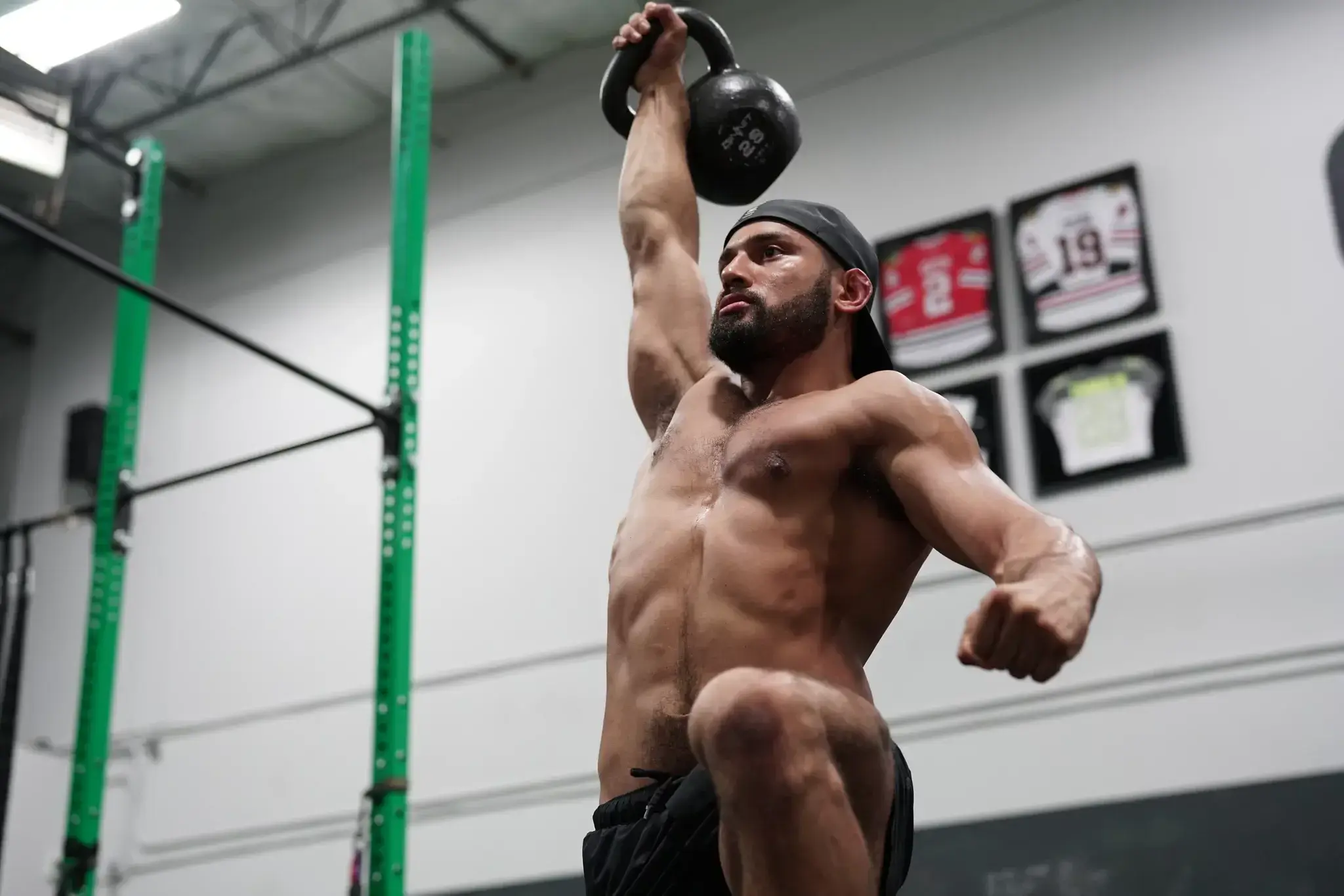 While he's busy pumping iron, you also decide to follow his example and lift some weights while waiting for him.