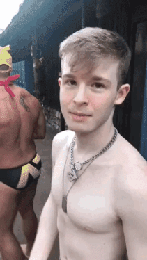 Aproaching him in a public place, you pull onto his swimming trunks in order to check his caged cock. Giving it a tug with your finger, you enjoy how snugly it fits.