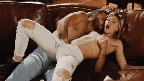 You slip your hand down the front of her pants, your fingers expertly finding their way past the fabric. Pressing firmly against her, you slide your fingers along her folds, teasing her as you feel her squirm under your touch. The fit of her pants only adds to the intensity as you work her slowly.