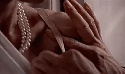 Remove her bra sensually