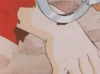 Befestige die Handschellen.