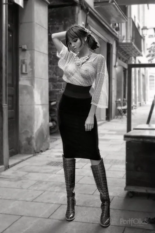 You just pose right there, clothed, but not hiding anything. Flaunting your body makes you feel hot!