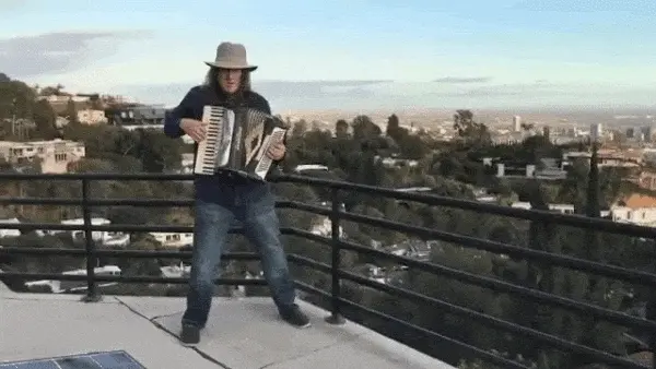 Anticipating their arrival, you greet them with a rooftop serenade, singing a sultry song for them!