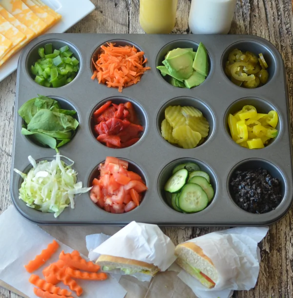 Time to start topping your sub! So many choices… pickles, peppers, onions, olives… what should you choose?