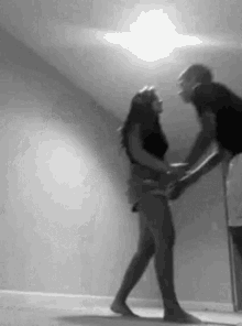 Pick her up and to wall 
