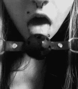 Put on a ball gag