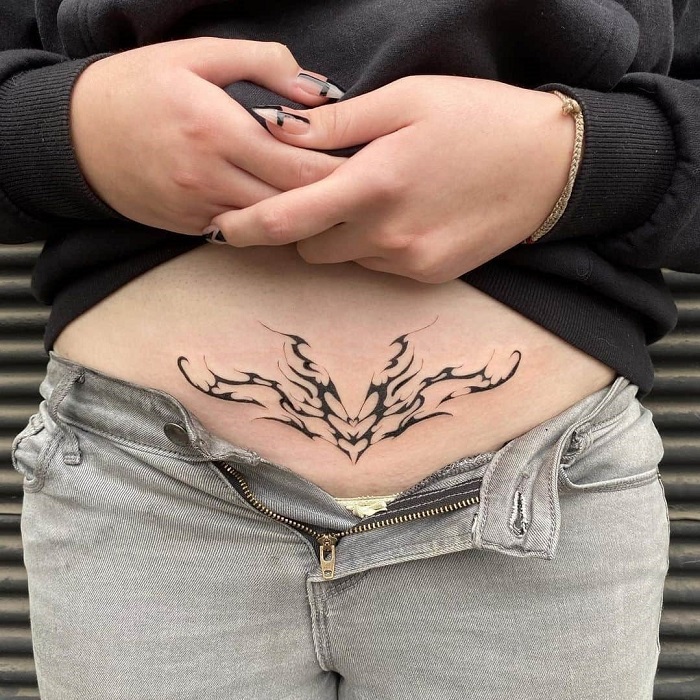 Reveal your womb tattoo