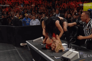 You lock her legs up and show off your submission skills. You put her into a hanging camel clutch!