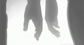 Gently hold their hand