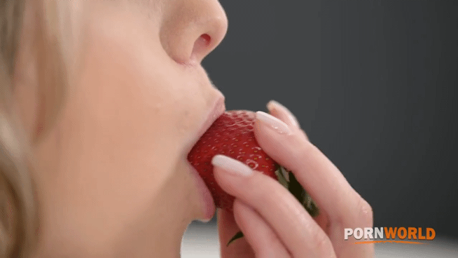 Seductively eat some fruit