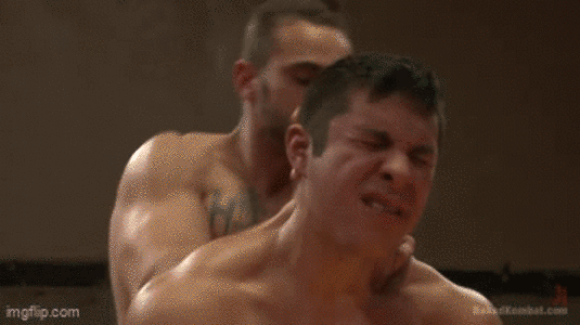 Push him into the floor and pound his ass