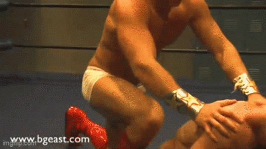 Pull his arms back while kneeling on his back