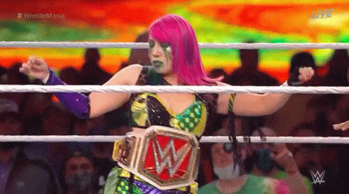 Champion dances with her title belt